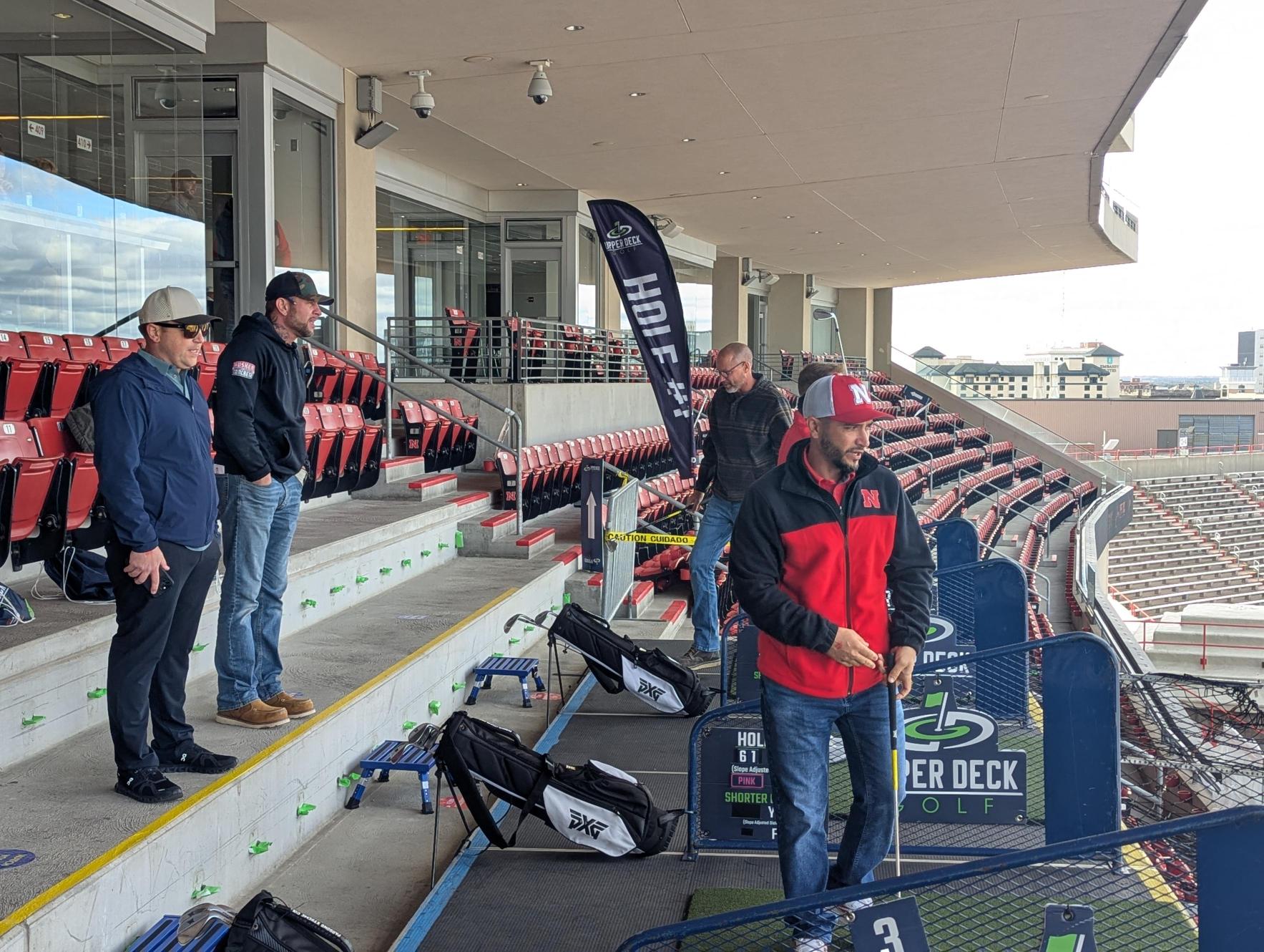 Fans play golf inside Nebraska football stadium