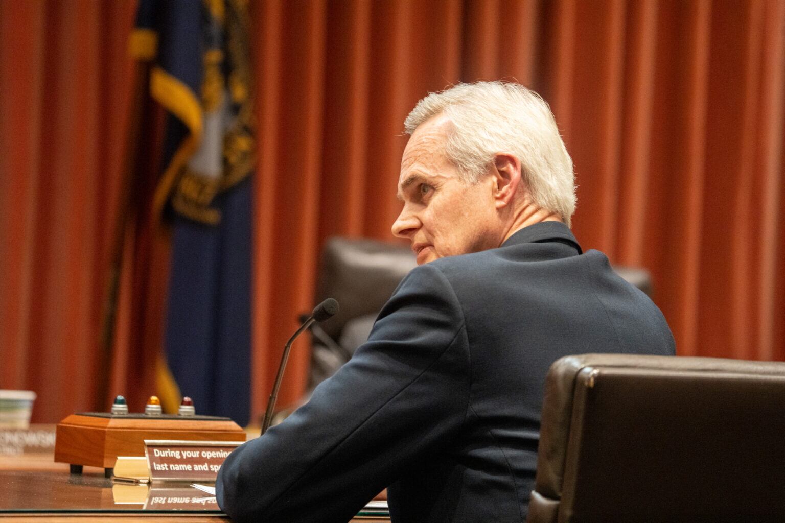 Nebraska auditor questions pay for absent retirement director