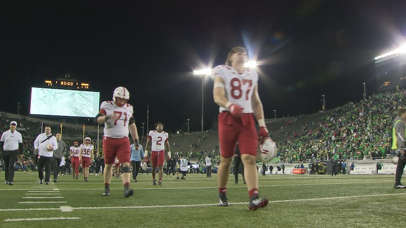 Nebraska players leave Oregon's field after a 17-14 loss to the Ducks Saturday, Oct. 17.