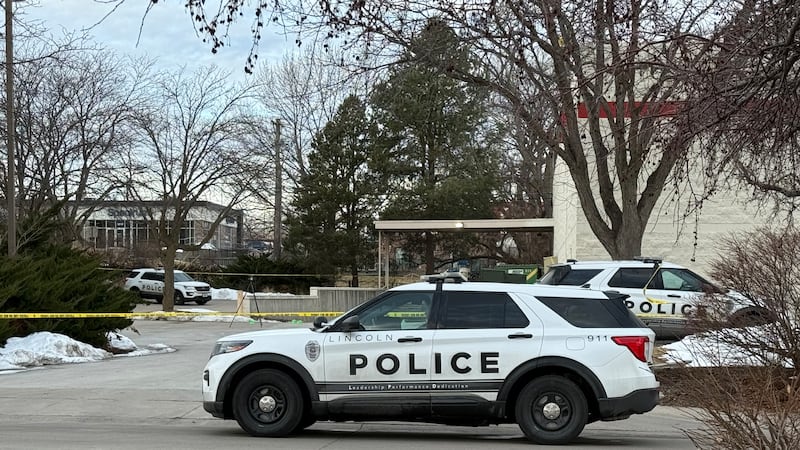 A large police presence could be seen near the Office Depot near 48th and R streets, just...