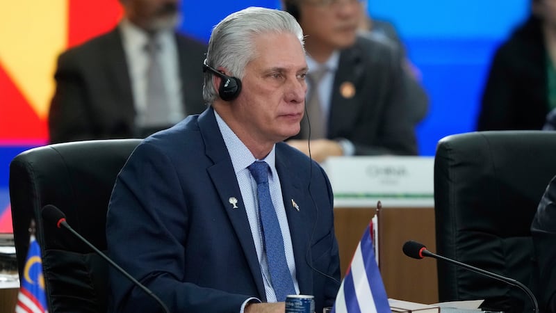 FILE - Cuba's President Miguel Diaz-Canel attends the 17th annual BRICS summit in Rio de...