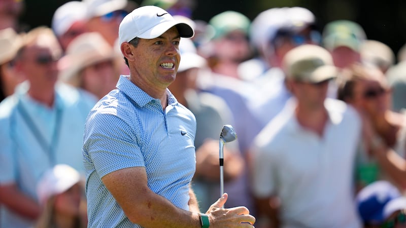 Rory McIlroy, of Northern Ireland, watches his tee shot on the sixth hole during the final...