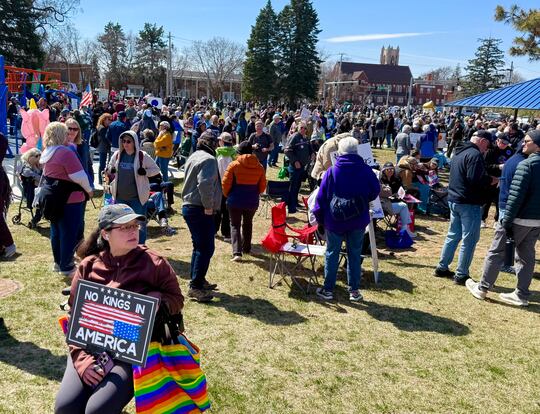 People gather at the Omaha No Kings protest. (Cindy Gonzalez/Nebraska Examiner)