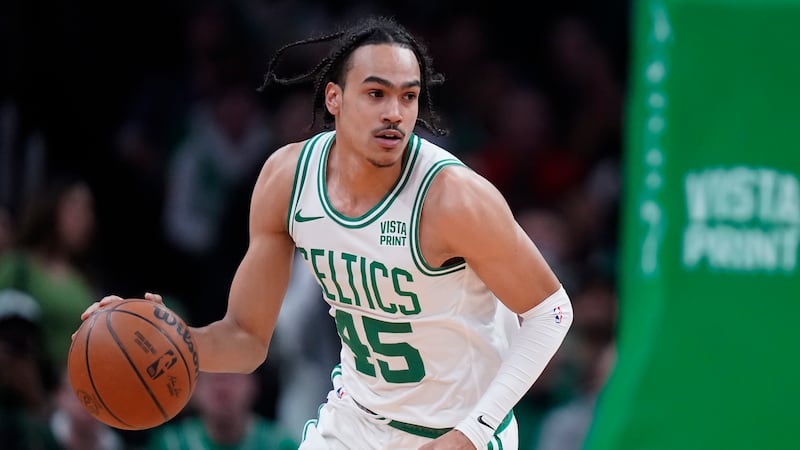 Boston Celtics guard Dalano Banton (45) runs with the ball in the first half of an NBA...