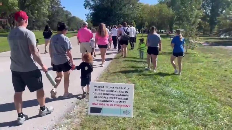 Image 14: Mothers Against Drunk Driving’s hosts signature walk at Holmes Lake