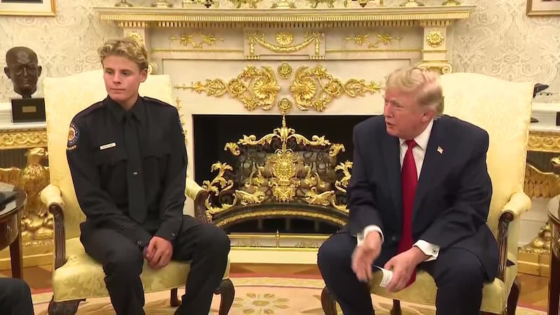 President Trump meets with lifeguard whose rescue of boy in California was caught on camera.